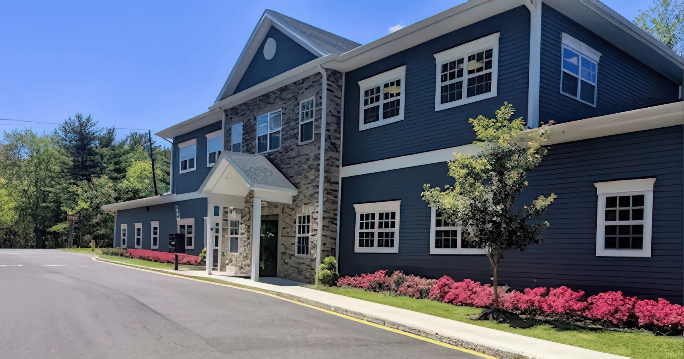 Exterior of Limitless Spine and Joint Care in Morganville, NJ, a short drive from Holmdel.