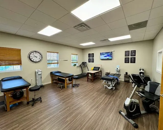Inside the Limitless Spine & Joint Care clinic in Morganville, NJ — modern treatment rooms supporting chiropractic, physical therapy, and acupuncture.
